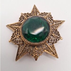 Vintage brooch Arthur Pepper faceted green glass eight point filigree star